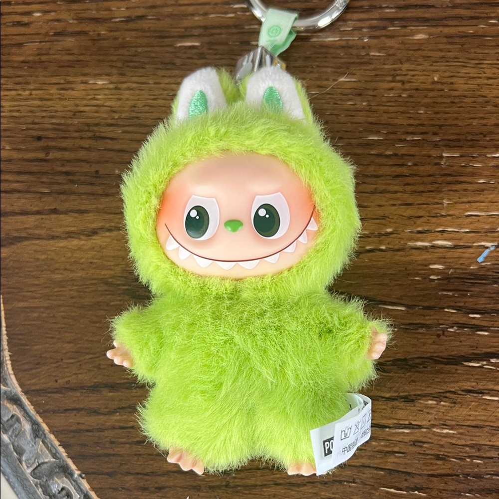 Green popmart Monster Keychain. Pin for love V